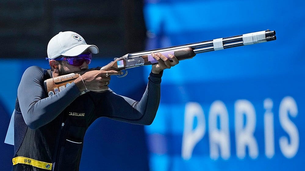 Amanjeet Singh Naruka competes in the Skeet mixed team final - | Photo: AP/Manish Swarup